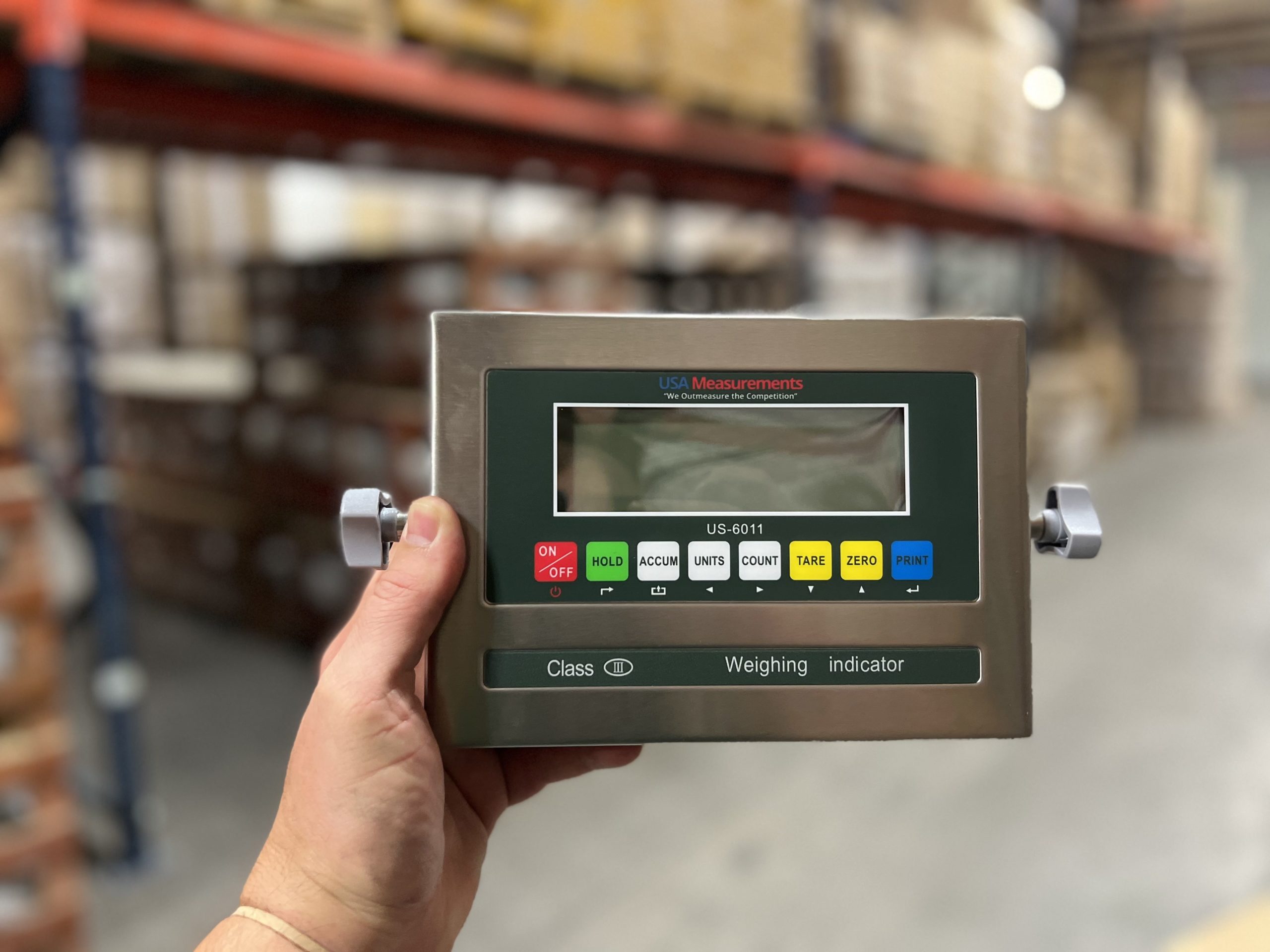 Technician holding a scale indicator